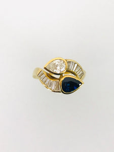 ANELLO CONTRARIE DIAMANTI ZAFFIRO ORO GIALLO